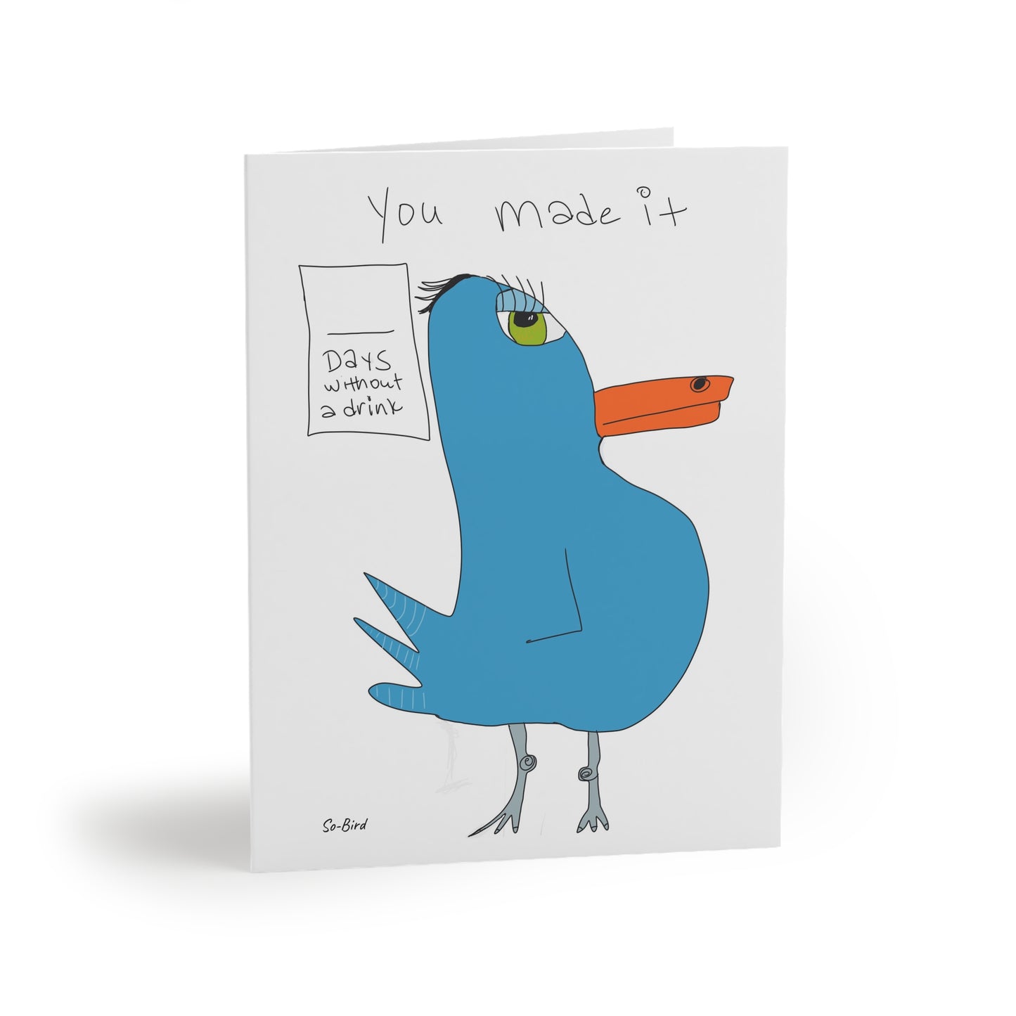 Printify’s Greeting Cards Recovery Celebration features a cartoon blue bird with an orange beak and green eye, plus handwritten "You made it" text and a sign reading "Days without a drink"—perfect for celebrating recovery milestones.