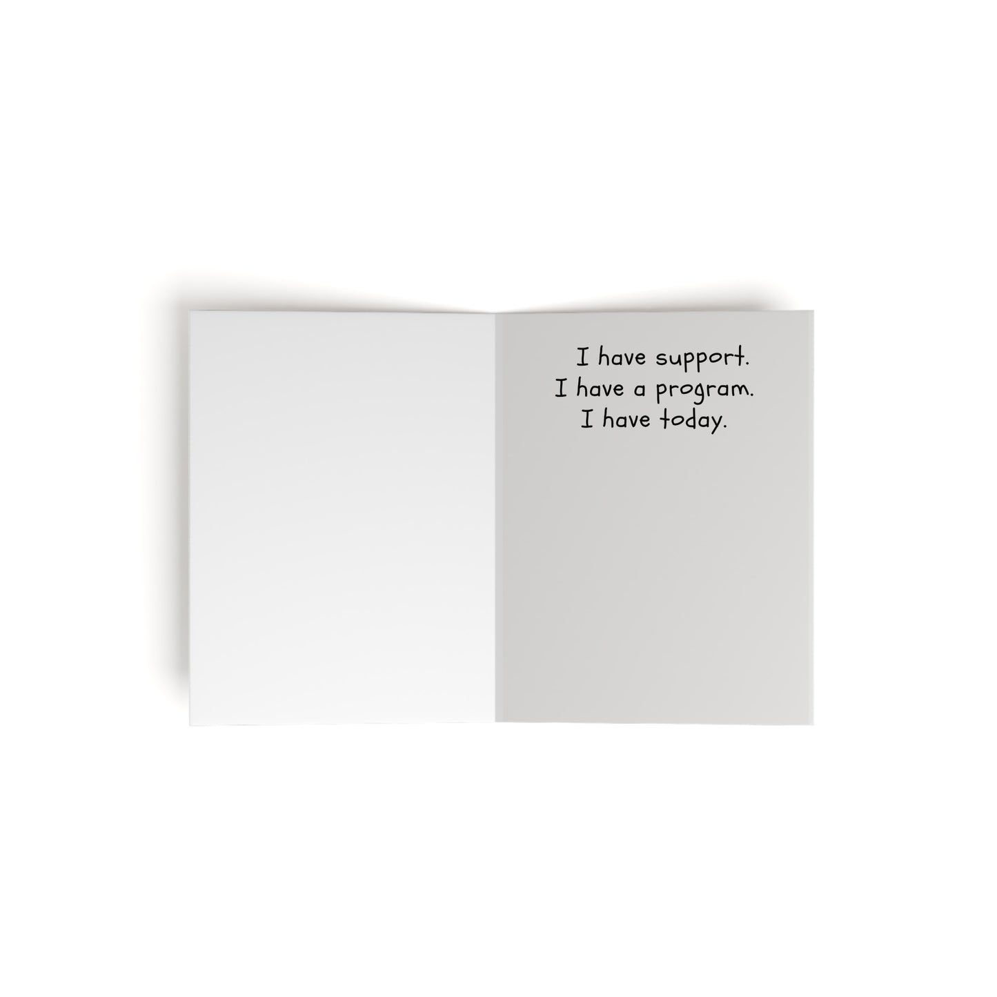 The Printify Greeting Cards Set - Powerless, not helpless features an inspirational message: "I have support. I have a program. I have today." The left page is blank, perfect for sharing words of encouragement with someone special. Available in 8, 16, or 24 pcs.