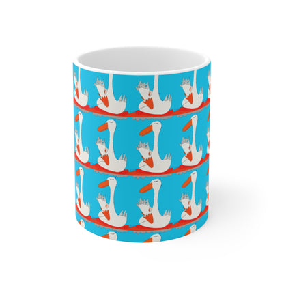 The Printify Many Ducks Mug - 11oz features a white ceramic design with cartoon ducks in blue crowns holding red hearts, all set against a bright blue background.