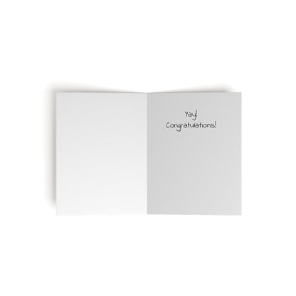The Printify Greeting Cards Recovery Celebration features an open card with a blank left side and "Yay! Congratulations!" in playful font on the right, set against a plain white background.
