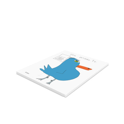 The Greeting Cards Recovery Celebration by Printify features a white cover with a cartoon blue bird, orange beak, and the words "You made it." A small box says "nice work." Great for greeting card fans, it lies flat on a white surface.