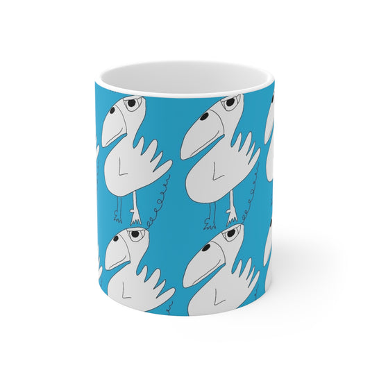 The One Among Many Mug - 11oz by Printify is a white ceramic cup with a blue background, adorned with playful, abstract cartoon birds featuring large beaks, small wings, and curly legs in a whimsical repeating pattern.
